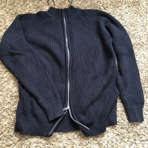Mock neck, zipper back sweater.